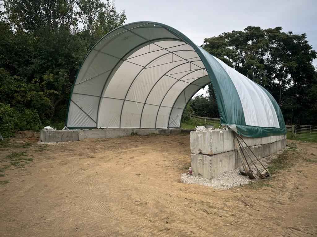 Running shed on field